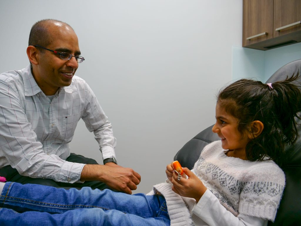 Dr. Jagatjit Dhillon with young patient